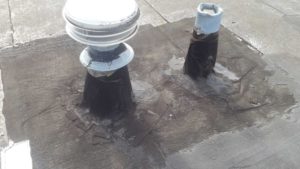 Old Cracked Patched EPDM Flat Roofing material