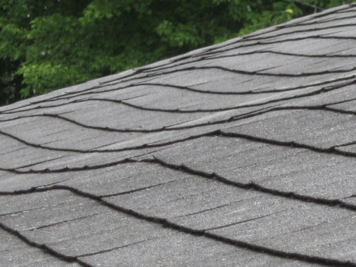 Sagging roof asphalt shingles
